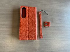 エポイ手帳型 iPhoneXケース オレンジ タッセル付き - メルカリ