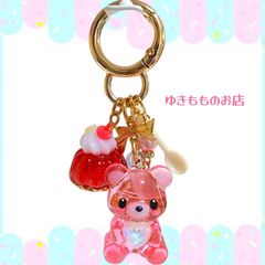 幸せを運ぶくまちゃん 天然石入りキーホルダー オルゴナイト - メルカリ