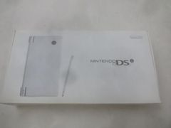 Nintendo DS (DSi) console, TWL-001, white, working condition, includes box, peripherals, and manual. Used item.