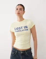 エイソス レディース トップス Tシャツ グラフィック ASOS DESIGN baby tee with lost in translation graphic in buttermilkのサムネイル