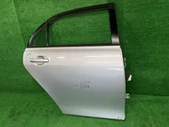カローラアクシオ NZE144 右リアドア X HIDリミテッド 4WD ニホンイタ M3108 67003-12A30 1F7 カローラアクシオ NZE144 右リアドア X HIDリミテッド 4WD ニホンイタ