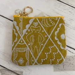 ハンドメイド　ミナペルホネン　シンフォニー　マスタードのミニポーチのサムネイル