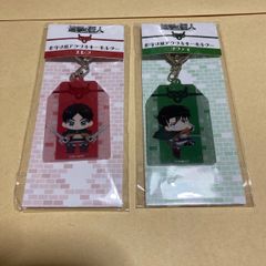 Attack Titan Amulet-style acrylic keychains: Eren and Levi