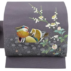 名古屋帯 逸品 羽田登喜 落款 鴛鴦 枝花 金銀彩 縮緬 灰紫 正絹 【中古】のサムネイル