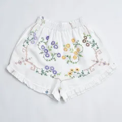 Remakeリメイク 再構築 テキスタイル フラワー 刺繍 フリル デザイン ショートパンツ ショーツ ホワイト 短パン 花柄 裏地付き 古着 W58〜98cmのサムネイル