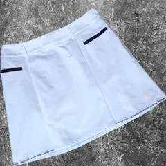 未使用レベル LANVIN SPORT WEB限定 タックスカート 吸汗速乾 ストレッチ UVカット Coolist D－Tec ストレッチスカート ホワイト ネオンオレンジ ラバーロゴ ロゴテープ テープロゴ レディース ゴルフスカート ゴルフウェアのサムネイル