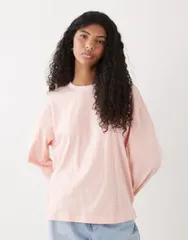 モンキ レディース トップス Tシャツ Monki oversized long sleeve tshirt with side slits and coral stripes Pink Coralのサムネイル