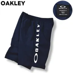 【定番】 オークリー OAKLEY ロゴ プリント ショーツ ショート パンツ ハーフ パンツ スリット入り M ネイビー スポーツ カジュアル メンズのサムネイル
