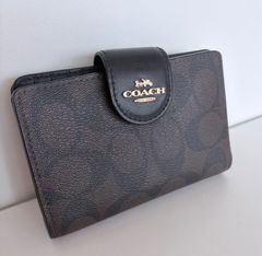 COACH 二つ折り財布 シグネチャー ブラック - メルカリ