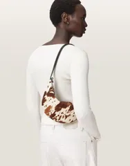 オールセインツ レディース バッグ プリント AllSaints luna micro shoulder bag in cow print Cow printのサムネイル