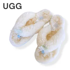 UGG アグ アイボリー 水色 レディース 靴 サンダル ミュール トングサンダル ビーチサンダル型 シープスキンボア リボン付き フラットソール【23cm】1267KZのサムネイル