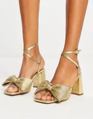 エイソス レディース シューズ サンダル ヒール ASOS DESIGN Hitched bow detail mid heeled sandals GOLD ゴールドのサムネイル