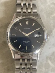 ORIENT オリエント UN7U-C0 クォーツ腕時計　デイト機能 黒文字盤　3針　 ヴィンテージウォッチのサムネイル