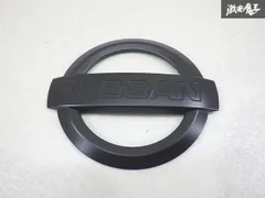 再塗装済 日産 純正加工 C11 ティーダ ラティオ フロント ラジエータ グリル ロゴ エンブレム ツヤ無し黒 90890-ED000 1個 棚9-3-Dのサムネイル