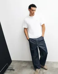 エイソス メンズ ボトムス デニムパンツ ジーンズ ASOS DESIGN relaxed tape red jeans in raw denim with pleats and buckle INDのサムネイル