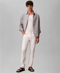 カルバンクライン メンズ ボトムス デニムパンツ ジーンズ Calvin Klein MenslimFit Stretch Denim Jeans Chalk White ホワイトのサムネイル