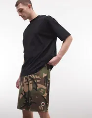 ベイシング エイプ メンズ ボトムス ハーフパンツ・ショーツ ショートパンツ ジャージー Aape by A Bathing Ape loose fit jersey shorts in camo Mのサムネイル