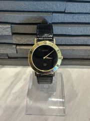 電池交換済み稼働品】GUCCI グッチ 3001M ローマンベゼル 黒文字盤 