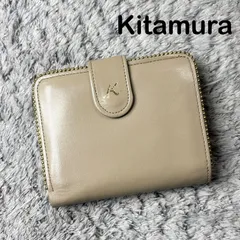 Kitamura キタムラ 二つ折り財布 がま口 ベージュ Kitamura キタムラ 二つ折り財布 がま口 レザー ベージュ ロゴ - メルカリ