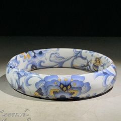 Blue and white porcelain bracelet with butterfly design, ceramic, decorative, handcrafted, art object, ornament.