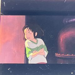 35mm film strip, Spirited Away, Studio Ghibli, "Anxious Chihiro," clear block frame, Hayao Miyazaki, released in 2001 (FLM011)