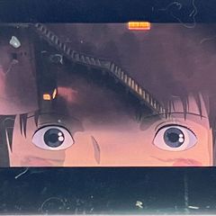 35mm film reel of Spirited Away, Studio Ghibli, "Chihiro's Eyes," Hayao Miyazaki, clear block frame, released in 2001 (FLM020)