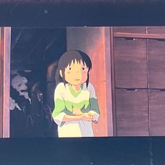 35mm Film Block of "Spirited Away" (Studio Ghibli) - "Chihiro with a Surprised Expression" - Framed Clear Block - Hayao Miyazaki - Released in 2001 (FLM032)