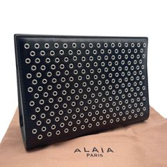ALAiA アライア クラッチバッグ セカンドバッグ レザー パンチング ブラック 黒 レディース 保存袋付き
