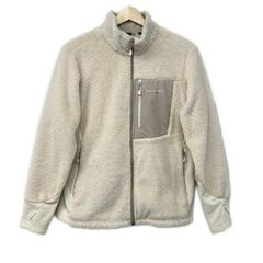 mont-bell(モンベル) ブルゾン サイズL レディース - アイボリー 長袖/ジップアップ/冬