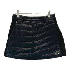 サイズ：S OAKLEY オークリー 591372JP ダウン ラップスカート  ブラック系 [240101762662] ゴルフウェア レディース ストスト