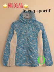 ⭐極美品⭐ ルコックスポルティフ Le coq sportif ジャケット 薄手 ジップアップ ロゴ刺繍 QB-576371 総柄 ブルー 青 ホワイト 白 O レディース WOMEN スポーツ アクティブ  秋 冬 秋物 冬物 防寒 温かい アウター