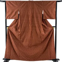 紬 身丈162cm 裄丈64.5cm M 袷 縦縞 幾何学模様 赤茶 正絹 逸品 【中古】