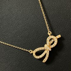 ABISTE アビステ ネックレス ゴールド リボン ラインストーン パヴェ ビジュー クリスタル風 モチーフ ボウ サークル エレガント フェミニン 華やか レディース コスチュームジュエリー ブランドアクセサリー 正規品 03EC-0005