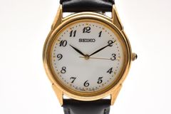 SEIKO セイコー V701-1920 クオーツ 3針 ホワイト 白 文字盤 アラビア数字 ゴールドカラー 金メッキ GP ラウンド ブラック 黒 レザーベルト シンプル クラシック メンズ 腕時計 稼働品 電池交換済み セイコー腕時計 ウォッチ WATCH