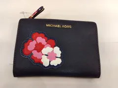 M24 マイケルコース MICHAEL KORS  未使用品 お花のポイントがかわいい パスケース付きの落ち着いたネイビー