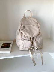 フリルショルダー 巾着ボディバッグ アイボリー A4収納 軽量 - メルカリ