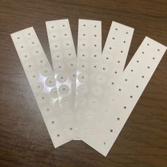 【期間限定】耳つぼ・ジュエリー専用 粒なしシール 直径7mm 耳つぼ用穴あり台紙 1シート20枚×5シート 1粒用×100枚入り セミマット 肌専用接着剤でお肌に優しい 安心タイプのサムネイル