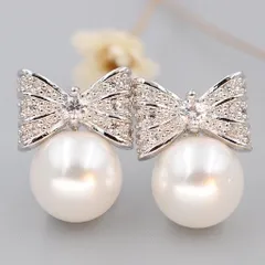 ピアス 本貝パール リボン スワロフスキー 可愛い 高品質 上品 職場 誕生日 記念日 クリスマス 母の日 テレワーク ランチ会 金属アレルギー対応