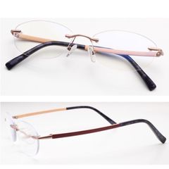 Lightweight and stylish reading glasses for men and women. New, blue light blocking, rimless, rimless, ULTEM two-point, rimless, lightweight, and comfortable. Reduces pressure. Available in +1.0, +1.5, +2.0, +2.5, and +3.0. XM206.