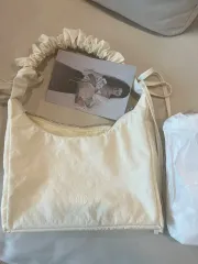 アンタイド シャーリングリボンバッグ アイボリー