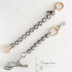 マクラメ編みのフェザーキーホルダー ＊ バッグチャーム - メルカリ