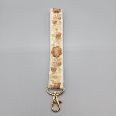 [095]インド刺繍リボンのスマホ用ハンドストラップ（ベージュ系、金具：ゴールド系）、ハンドメイド