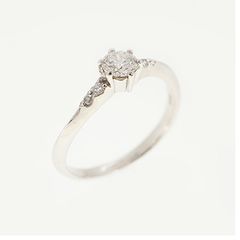 ダイヤモンド0.251ct メレダイヤモンド0.19ct Pt900 リング - メルカリ