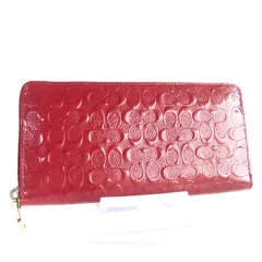 ■極上美品(使用履歴些少)■COACH  コーチ　エンボス加工ミニシグネチャー　ラウンドファスナー　長財布　エナメル　パテントレザー　レッド系　ゴールド金具　52464 レディース