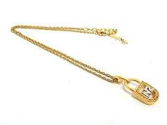 COACH キルテッド パッドロック チェーン ネックレス - メルカリ