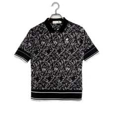 中古 レディース ルコックスポルティフ le coq sportif 半袖ポロシャツ L 黒 ハーフジップ 5分袖 総柄