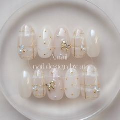 アイボリー×グレージュのリボンチェックネイル⋆*