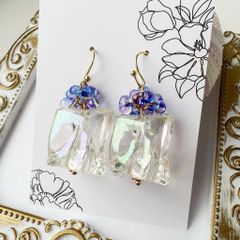 フローライト トリプレット フラワーカービングピアス - メルカリ