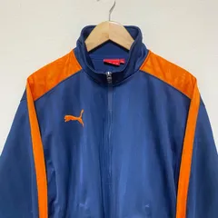 (^w^)b PUMA プーマ トラックジャケット 日本製  ロゴ 刺繍 紺系 ネイビー ジャージ バックプリント スポーツ ウェア ランニング  ウォーキング フィットネス トレーニング スタンドカラー オレンジ ライン サイドライン メンズ サイズS M