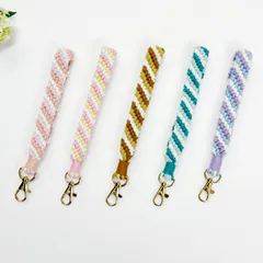 マクラメ編みスマホストラップ　ハンドストラップ　 手首　落下防止　携帯　手編み　ハンドメイド　手作りもの　イエロー　グリーン　プレゼント　女性　ピンク　黄色　緑